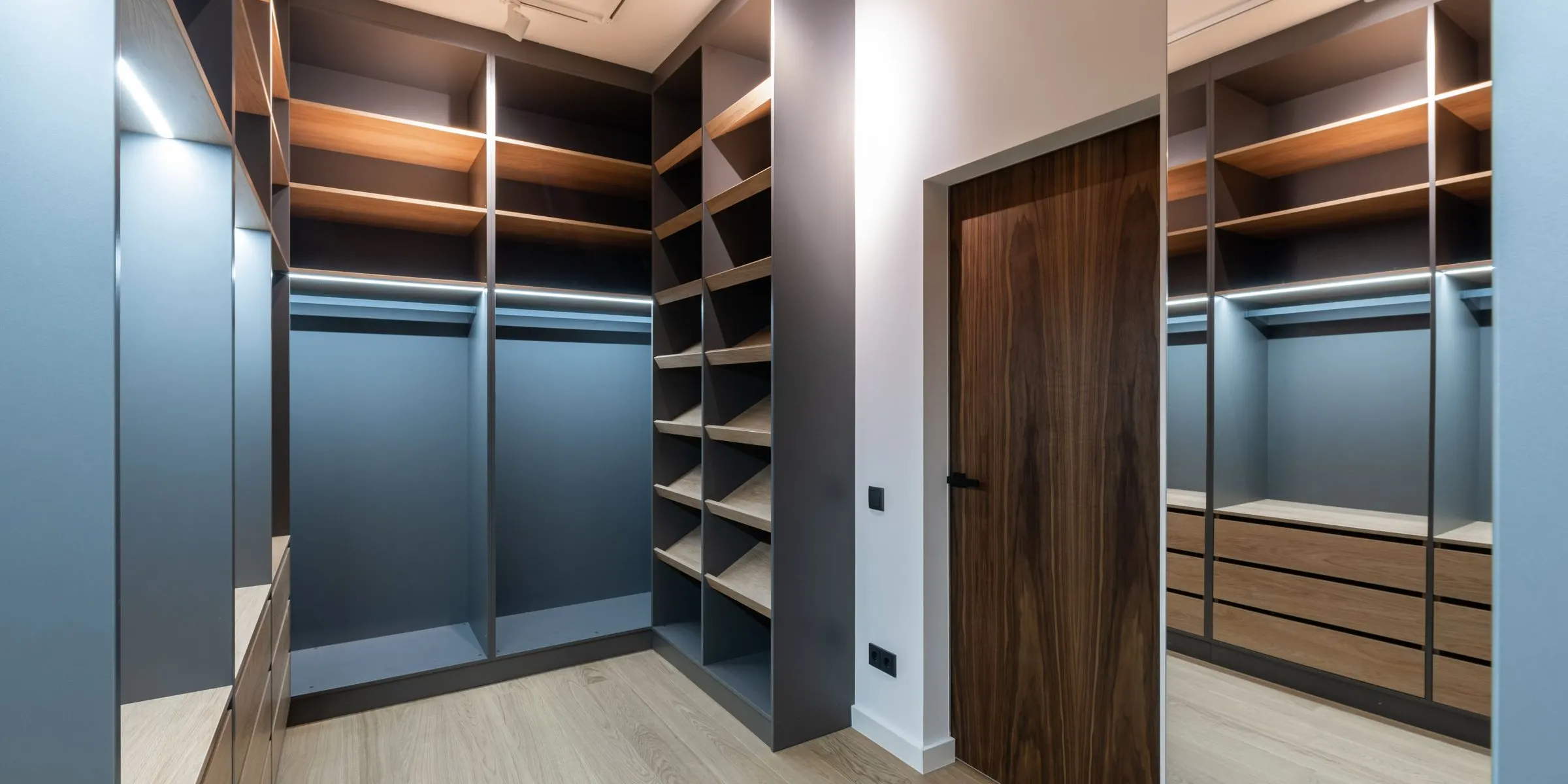 Walk-in closet with an island — main photo