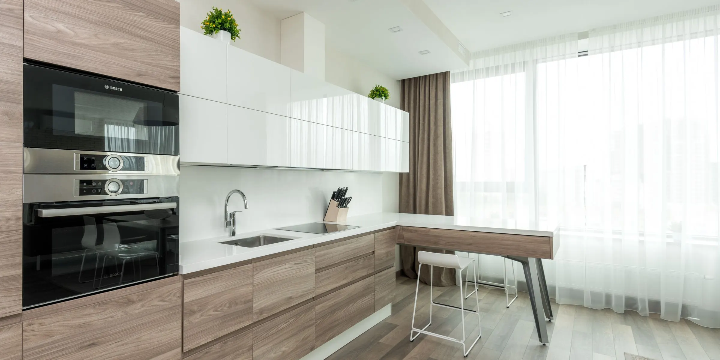 Warm oak kitchen with an island — main photo